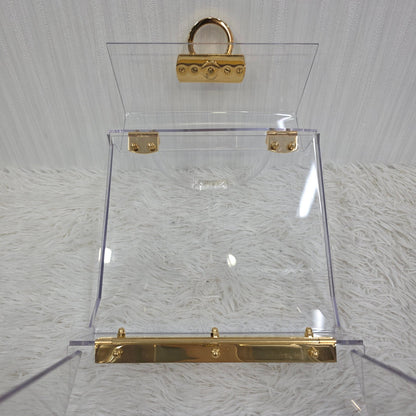 Salvatore Ferragamo Gancini Skeleton Handbag in Clear with Gold Hardware [Pre-Owned]