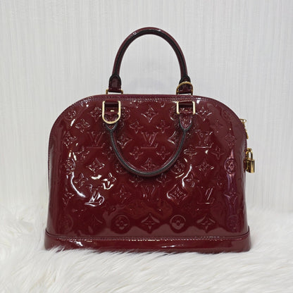 Louis Vuitton Patent Alma Handbag (Pre-owned)