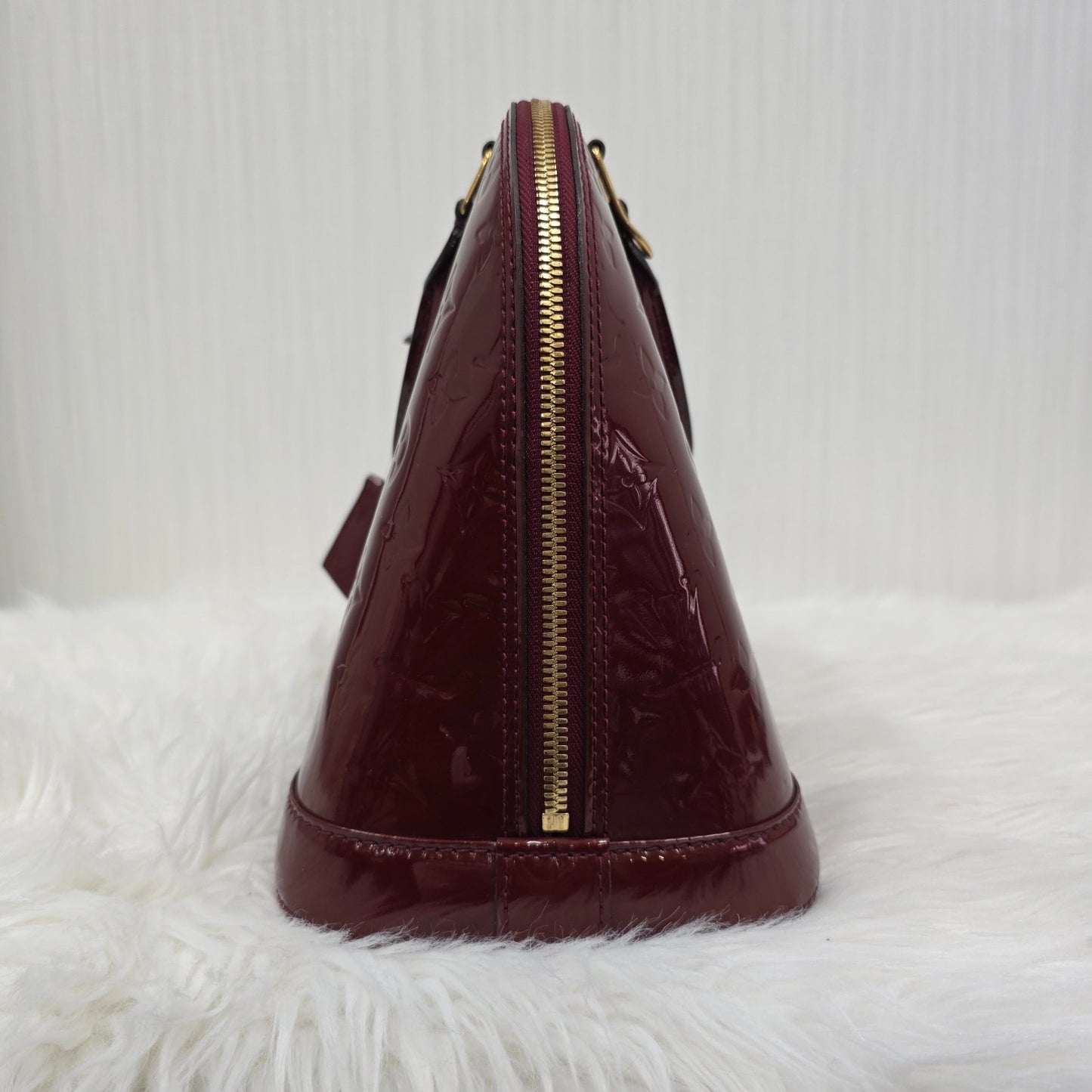 Louis Vuitton Patent Alma Handbag (Pre-owned)