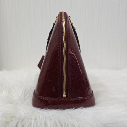Louis Vuitton Patent Alma Handbag (Pre-owned)