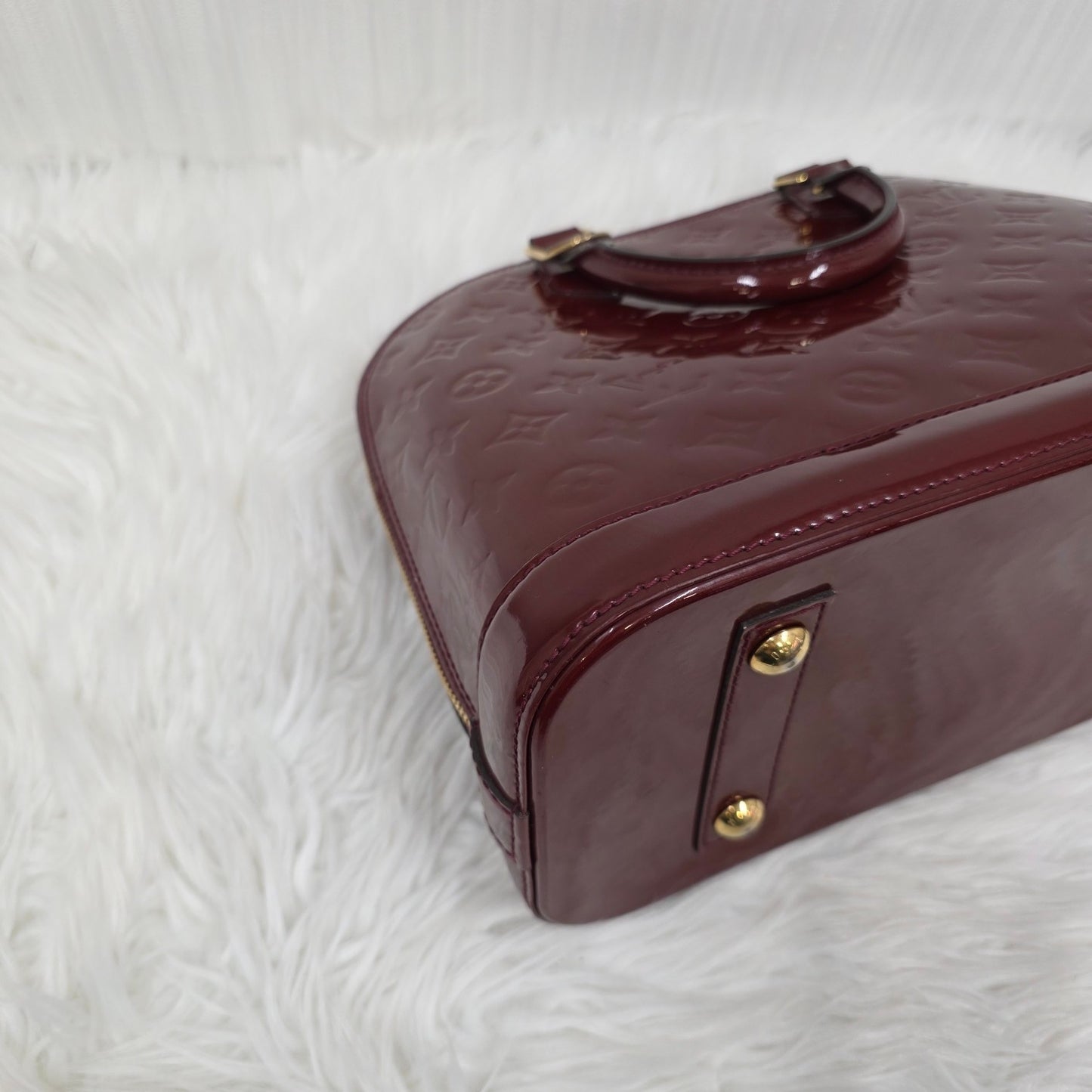 Louis Vuitton Patent Alma Handbag (Pre-owned)