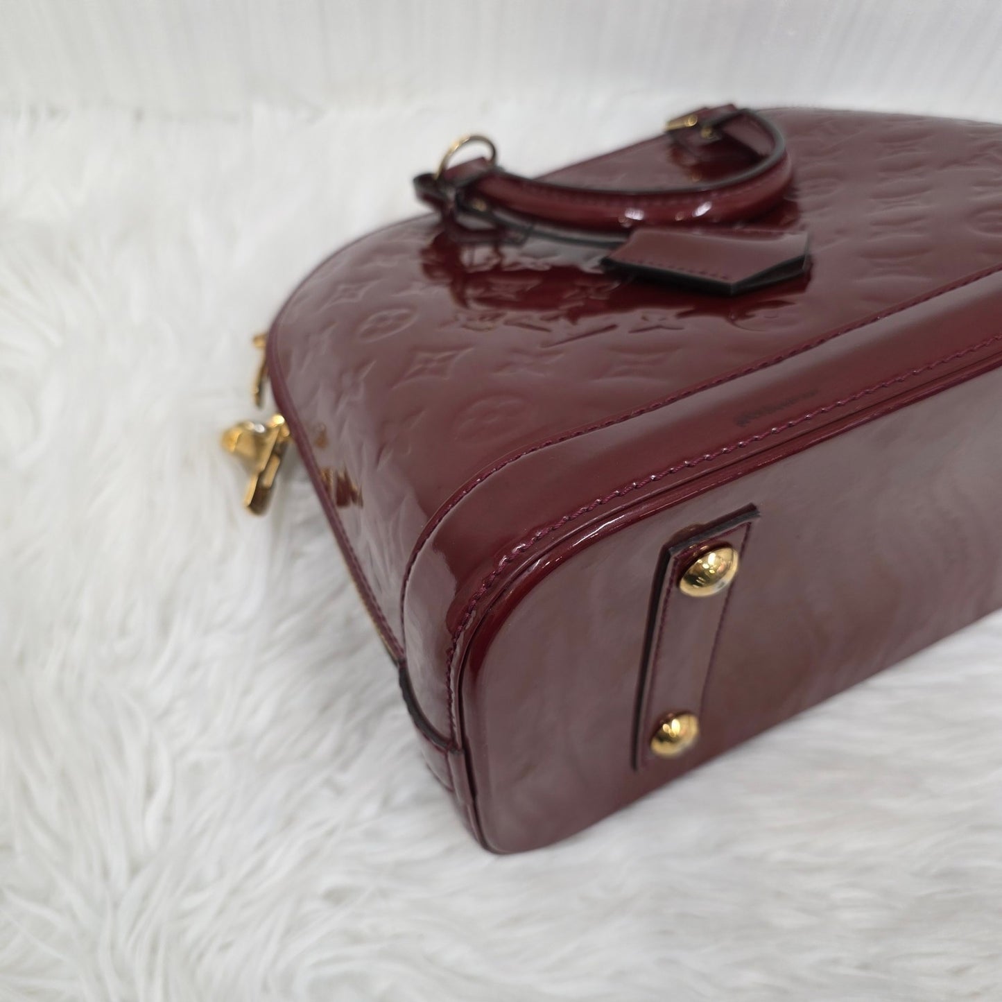 Louis Vuitton Patent Alma Handbag (Pre-owned)