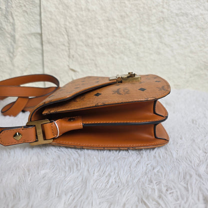MCM Visetos Cognac Saddle Crossbody Handbag (Pre-Owned)