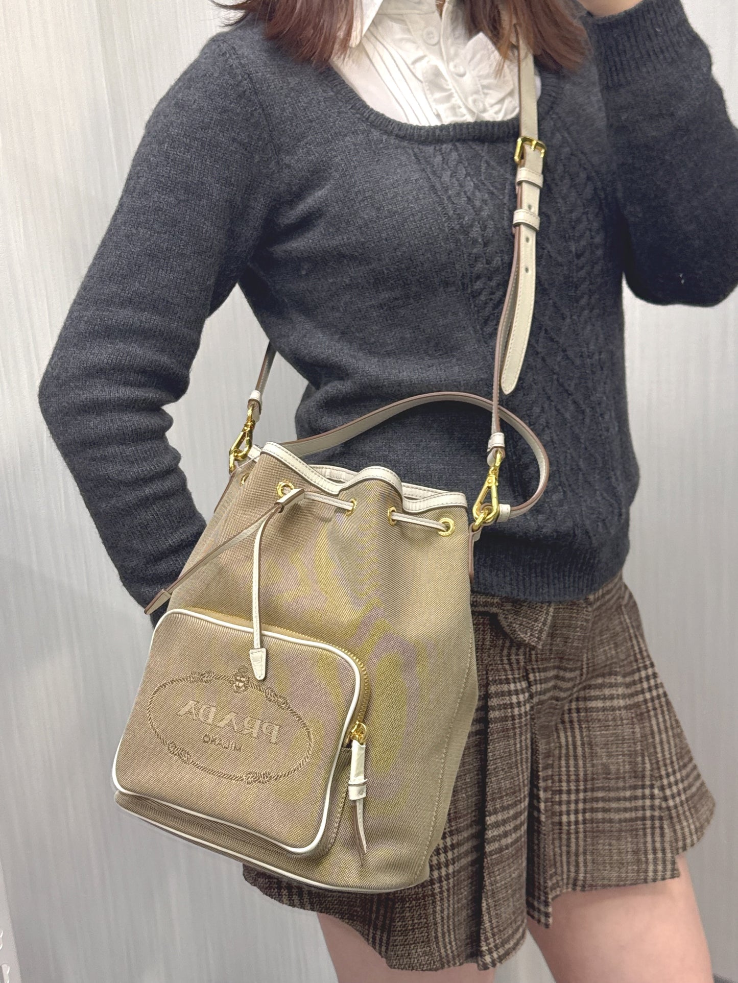 Prada Canvas Drawstring Bucket Bag with Front Logo Pocket (Pre-Owned)