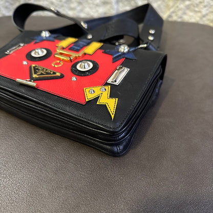 Prada Robot Appliqué Flap Shoulder Bag in Black Leather with Multicolor Patches (Pre-owned)