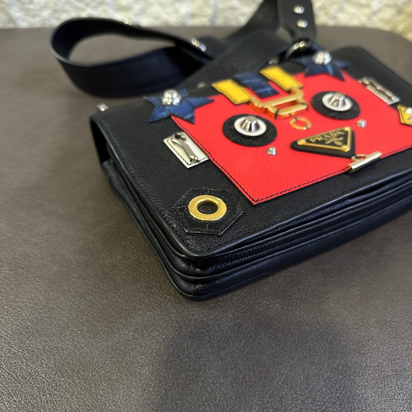 Prada Robot Appliqué Flap Shoulder Bag in Black Leather with Multicolor Patches (Pre-owned)