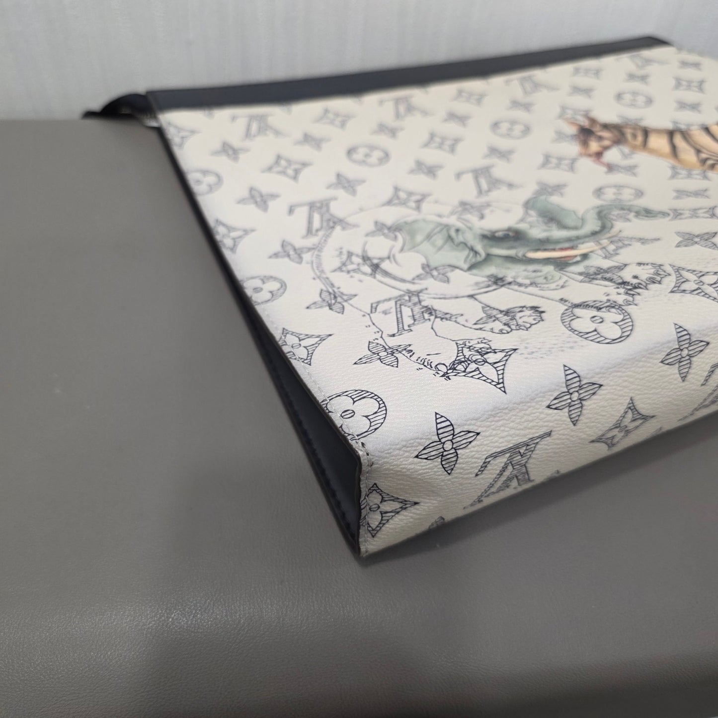 Louis Vuitton Monogram Savane Pochette Voyage GM Chapman Brothers Clutch (Pre-Owned)