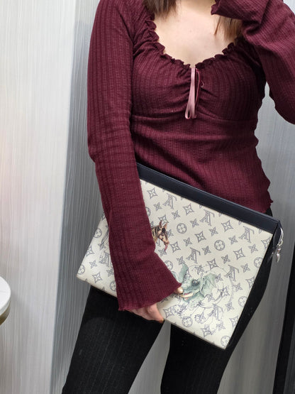 Louis Vuitton Monogram Savane Pochette Voyage GM Chapman Brothers Clutch (Pre-Owned)