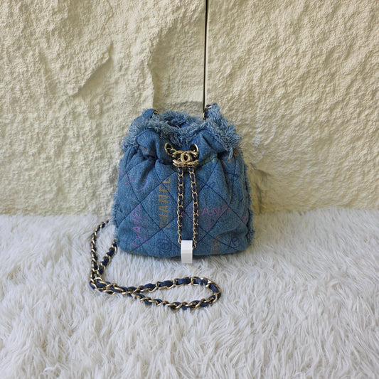 Chanel Quilted Denim Drawstring Chain Bag (Pre-Owned)