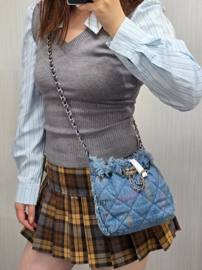 Chanel Quilted Denim Drawstring Chain Bag (Pre-Owned)