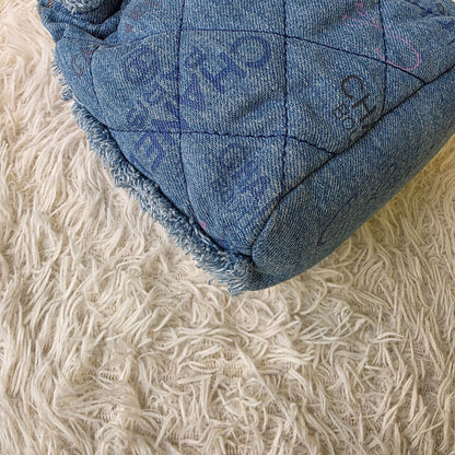 Chanel Quilted Denim Drawstring Chain Bag (Pre-Owned)