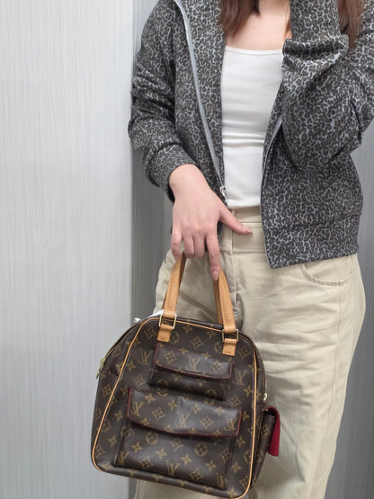 Louis Vuitton Monogram Excentri-Cité Handbag (Pre-Owned)