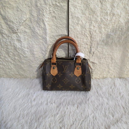 Louis Vuitton Monogram Mini Speedy Handbag (Pre-Owned)