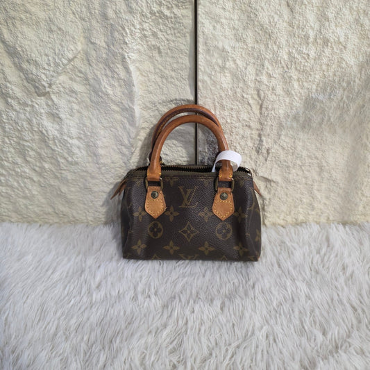 Louis Vuitton Monogram Mini Speedy Handbag (Pre-Owned)