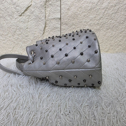 Chanel Studded Metallic Leather Drawstring Bucket Bag (Pre-Owned)