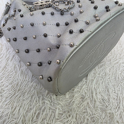 Chanel Studded Metallic Leather Drawstring Bucket Bag (Pre-Owned)
