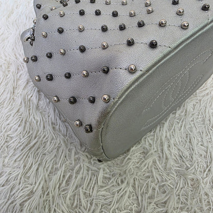Chanel Studded Metallic Leather Drawstring Bucket Bag (Pre-Owned)
