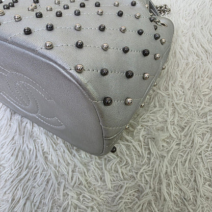 Chanel Studded Metallic Leather Drawstring Bucket Bag (Pre-Owned)