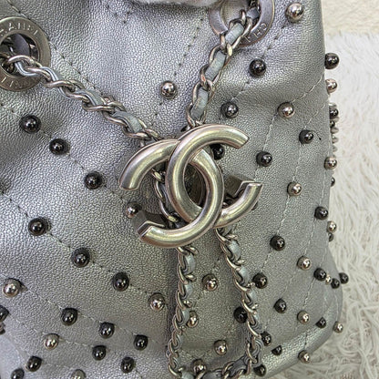 Chanel Studded Metallic Leather Drawstring Bucket Bag (Pre-Owned)