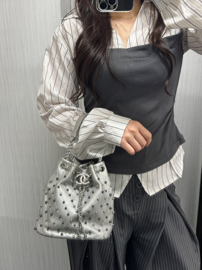 Chanel Studded Metallic Leather Drawstring Bucket Bag (Pre-Owned)