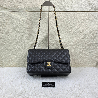 Chanel Black Quilted Caviar Leather Classic Flap Shoulder Bag (Pre-Owned)