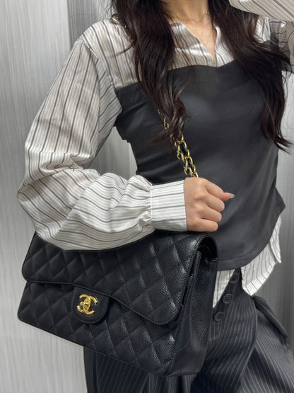 Chanel Black Quilted Caviar Leather Classic Flap Shoulder Bag (Pre-Owned)