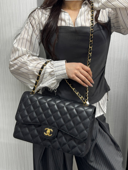 Chanel Black Quilted Caviar Leather Classic Flap Shoulder Bag (Pre-Owned)