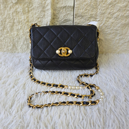 Chanel Black Quilted Leather Pearl CC Mini Flap Bag (Pre-Owned)
