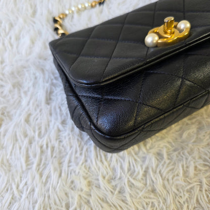 Chanel Black Quilted Leather Pearl CC Mini Flap Bag (Pre-Owned)