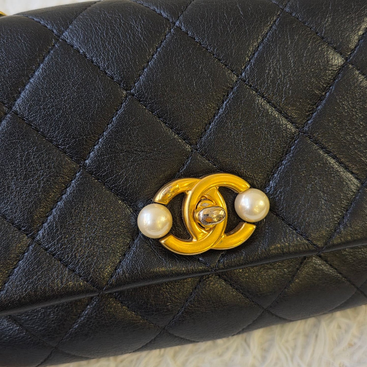 Chanel Black Quilted Leather Pearl CC Mini Flap Bag (Pre-Owned)