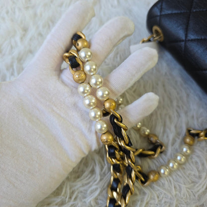 Chanel Black Quilted Leather Pearl CC Mini Flap Bag (Pre-Owned)