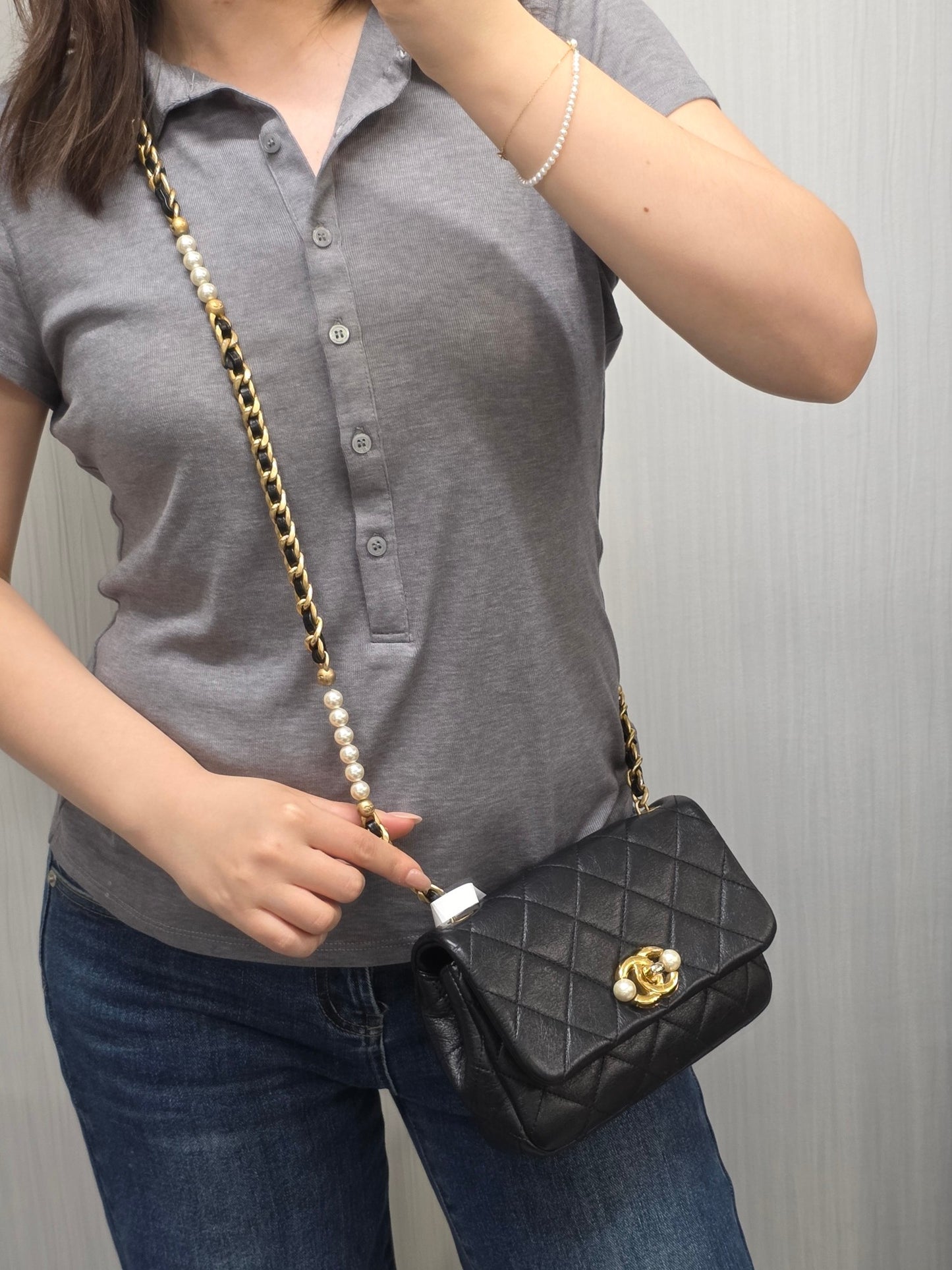Chanel Black Quilted Leather Pearl CC Mini Flap Bag (Pre-Owned)