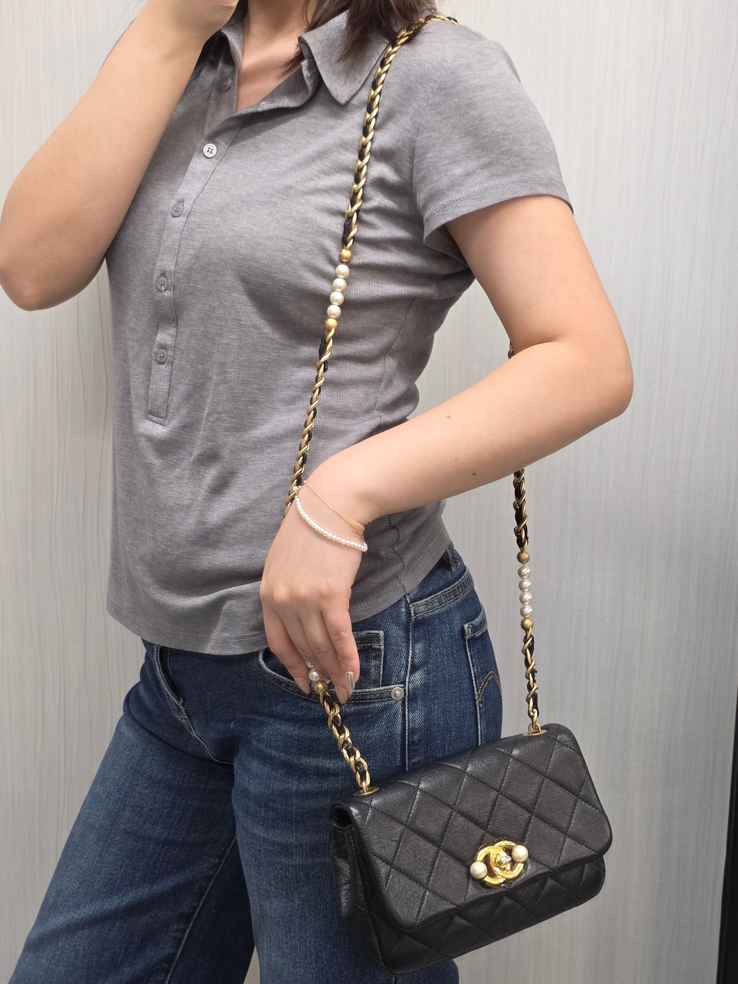 Chanel Black Quilted Leather Pearl CC Mini Flap Bag (Pre-Owned)