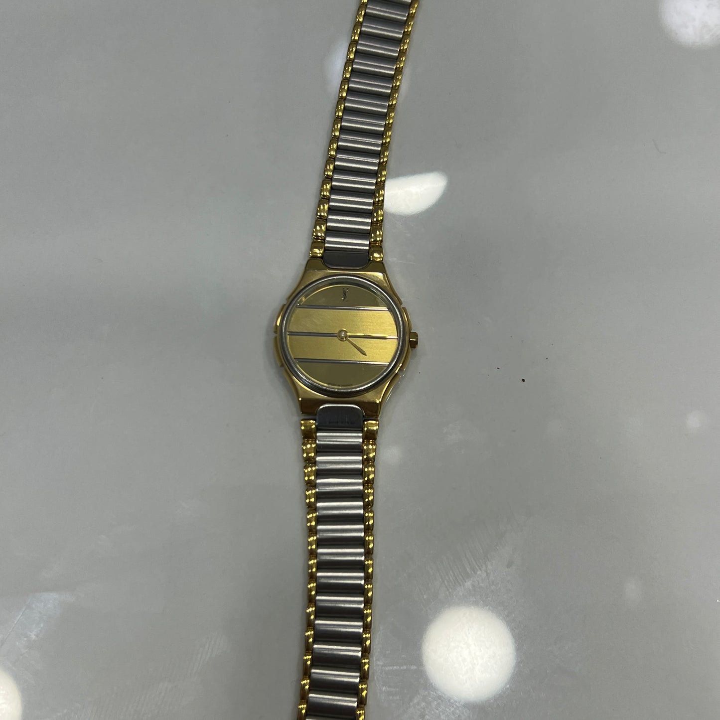 [Pre-Owned] Yves Saint Laurent Gold Bezel Silver Strap Watch  16602