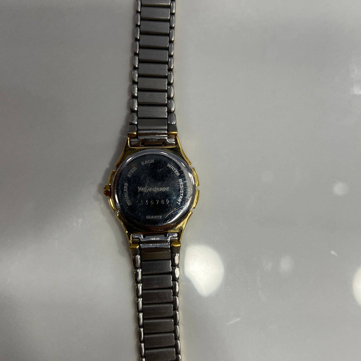 [Pre-Owned] Yves Saint Laurent Gold Bezel Silver Strap Watch  16602