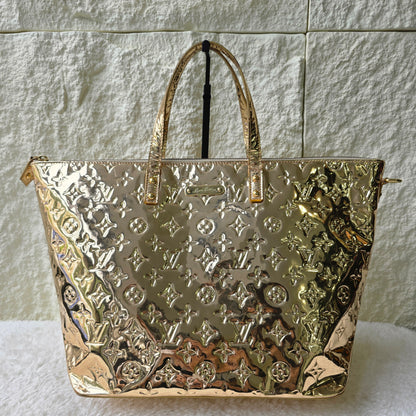 LOUIS VUITTON Bellevue PM Monogram Miroir Gold Handbag [Pre-Owned]