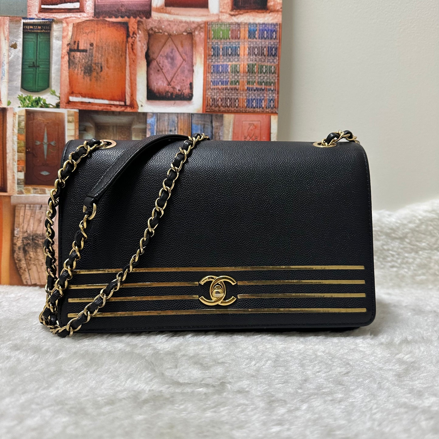 Chanel Black and Gold Flap Bag [pre-owned]