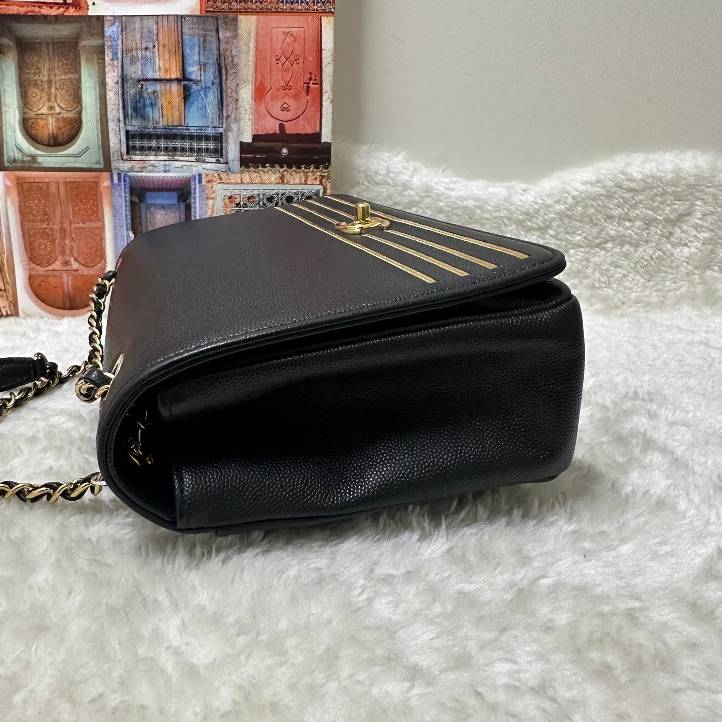Chanel Black and Gold Flap Bag [pre-owned]