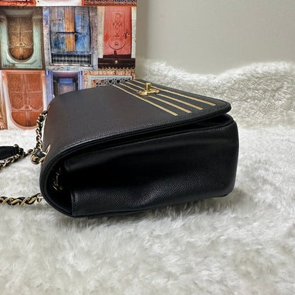 Chanel Black and Gold Flap Bag [pre-owned]