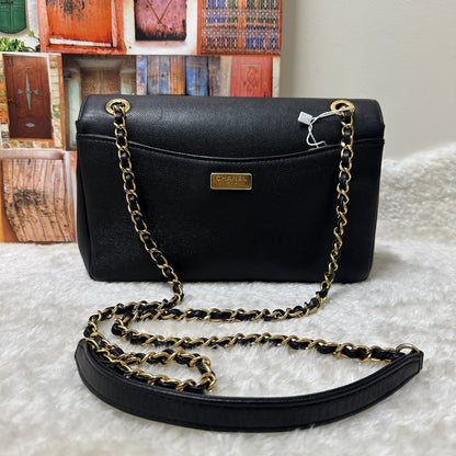 Chanel Black and Gold Flap Bag [pre-owned]