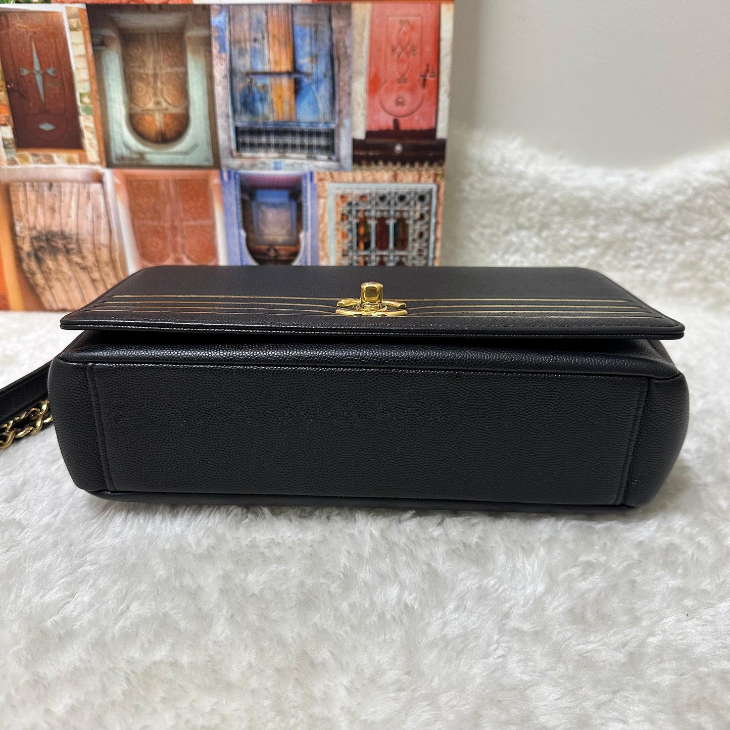Chanel Black and Gold Flap Bag [pre-owned]