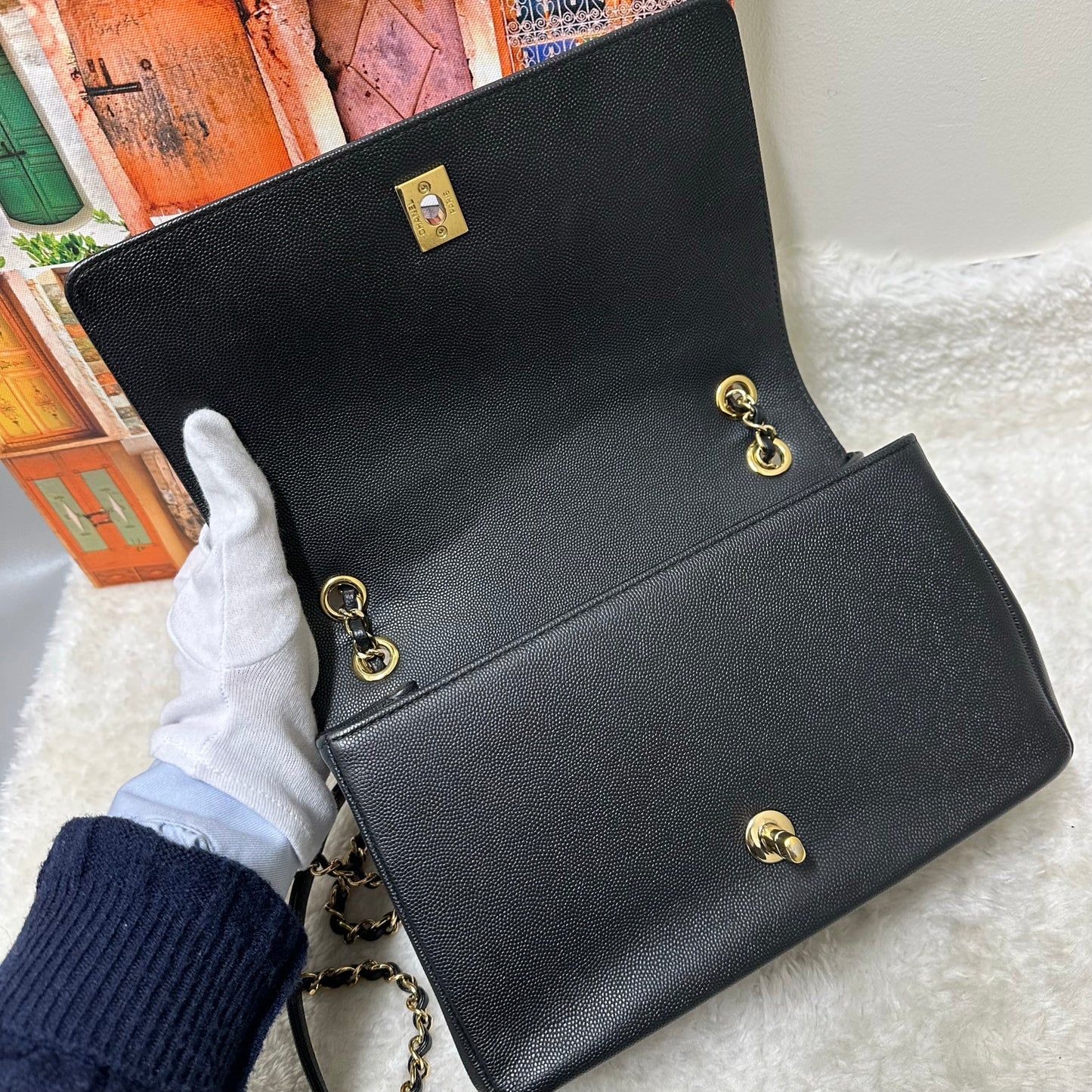 Chanel Black and Gold Flap Bag [pre-owned]