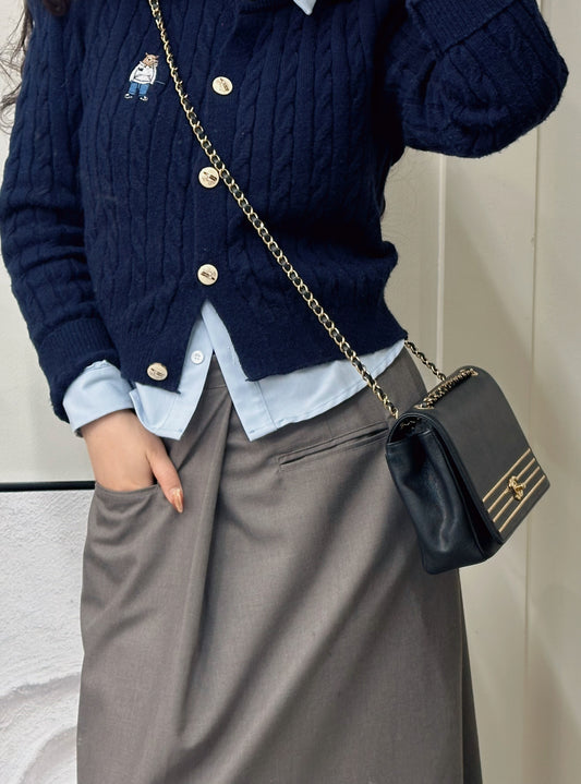 Chanel Black and Gold Flap Bag [pre-owned]