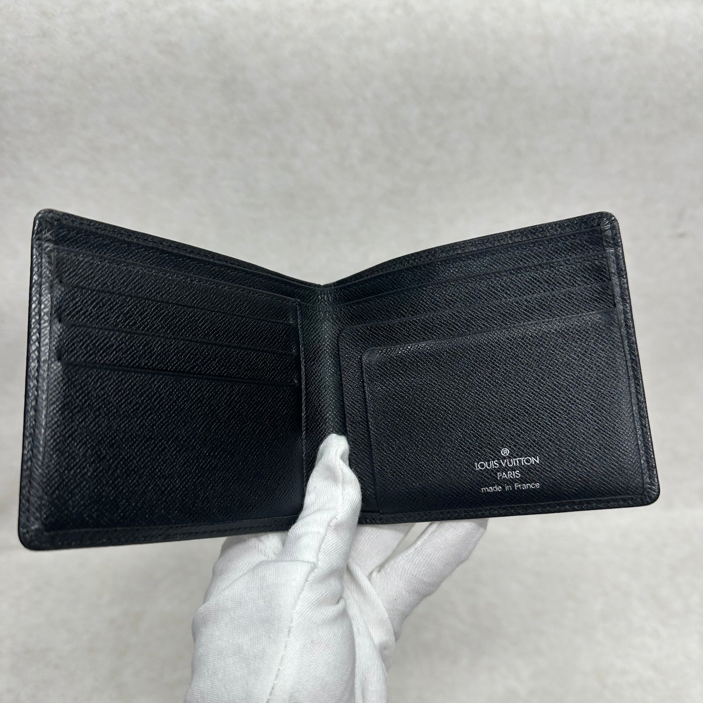 Louis Vuitton Black Leather Wallet [Pre-Owned]