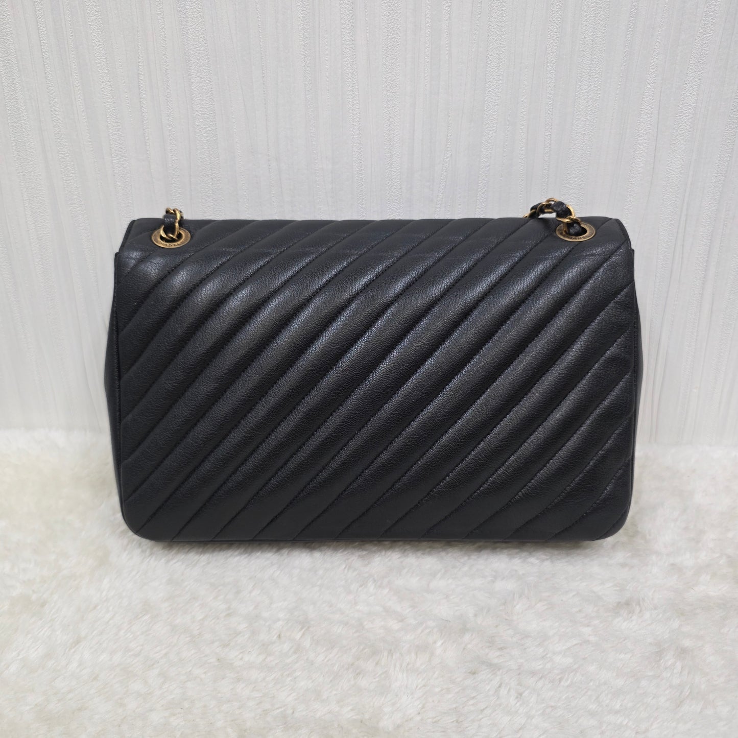 CHANEL Black & Gold Chevron Crossbody Bag [Pre-Owned]