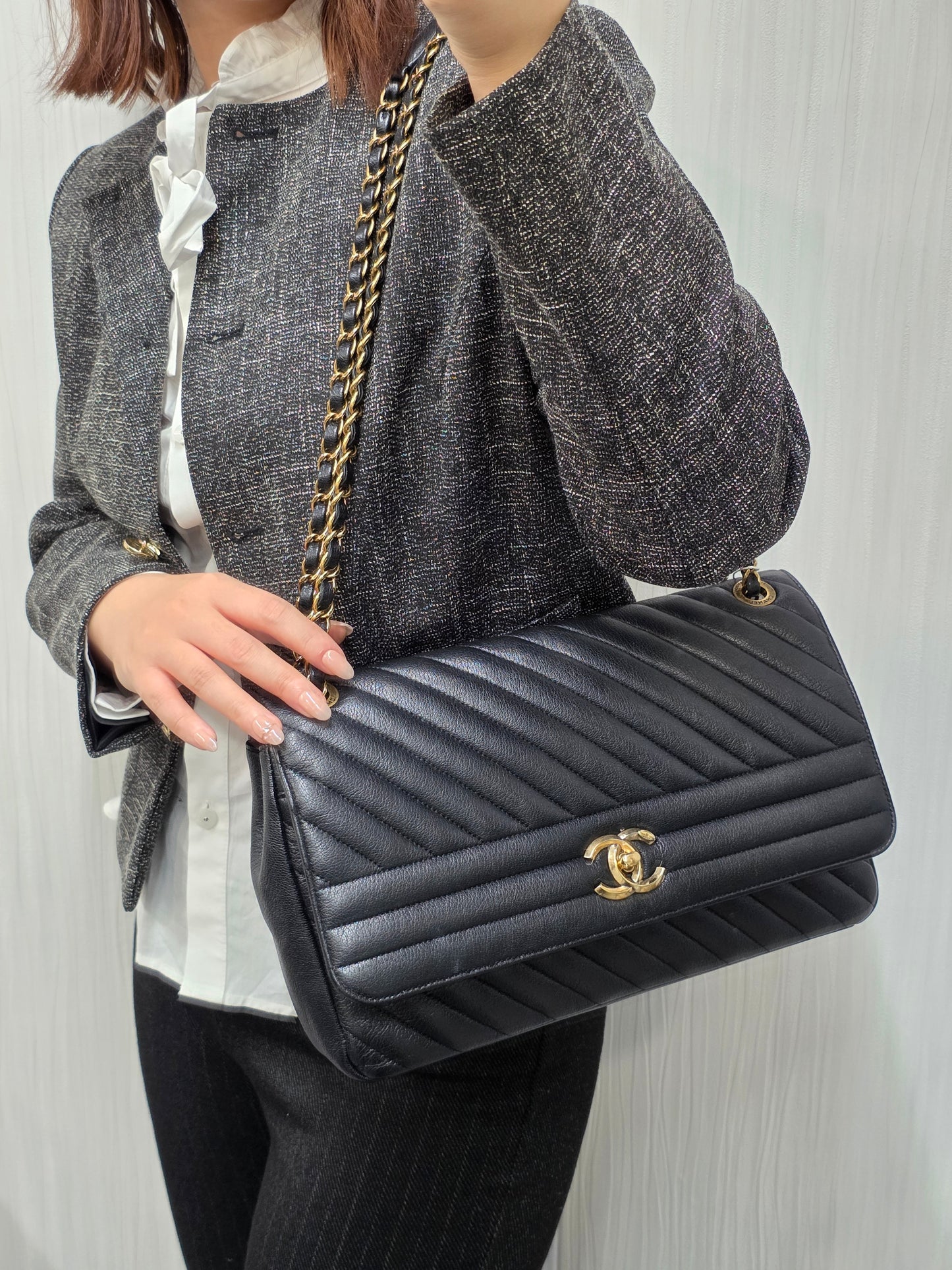 CHANEL Black & Gold Chevron Crossbody Bag [Pre-Owned]